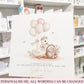 new baby congratulations card featuring an illustration of a duckling with balloons, a basket of flowers, and a heart-shaped bow. The text reads 'Congratulations on the birth of your beautiful baby girl Sophia Rose'.
