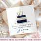 A square birthday card with a navy and cream cake illustration and the text 'HAPPY 30TH BIRTHDAY TO A SPECIAL GRANDSON James' is displayed on top of kraft paper envelopes and white fabric with dried flowers. A pink banner at the bottom reads 'PERSONALISE ME, ALL WORDING CAN BE CHANGED'.