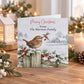 Personalised Christmas card pack featuring three different robin Christmas card designs with holly, red berries and snowy winter scenes.
