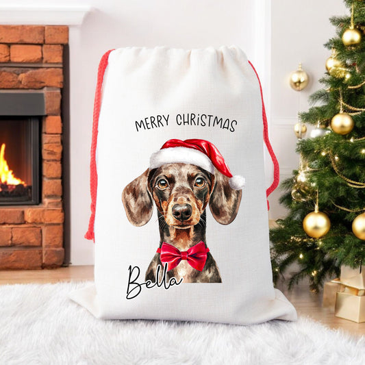 personalised christmas santa sack for dogs, red drawstring bag, with your dogs name on the front.  Perfect for dog lovers
