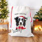 personalised christmas santa sack for dogs, red drawstring bag, with your dogs name on the front.  Perfect for dog lovers