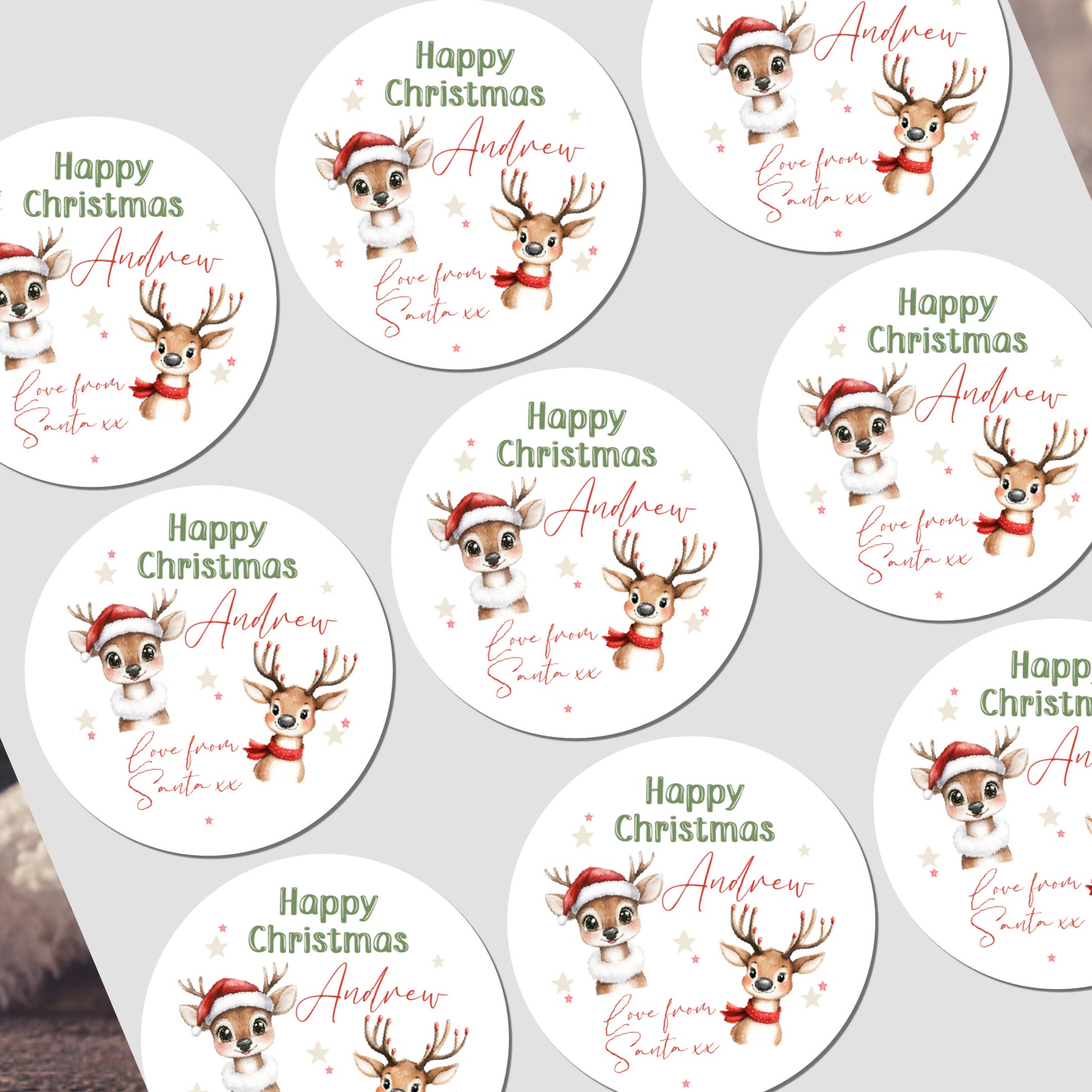 Circular Christmas stickers with reindeer design and text on a white background