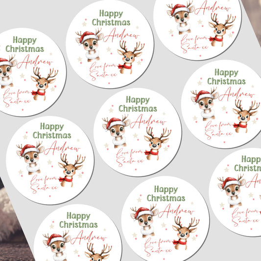 Circular Christmas stickers with reindeer design and text on a white background