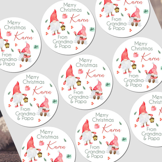 Circular Christmas stickers with gnomes and personalized text on a white background
