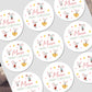 Circular Christmas stickers with cartoon mice design on a white background