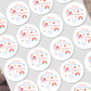 Personalized Christmas stickers with festive designs on a white background
