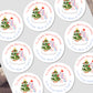 Personalized Christmas stickers with unicorns and trees on a white background