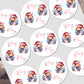 Stickers with a dinosaur wearing a Santa hat and the name 'Rory' on a white background.