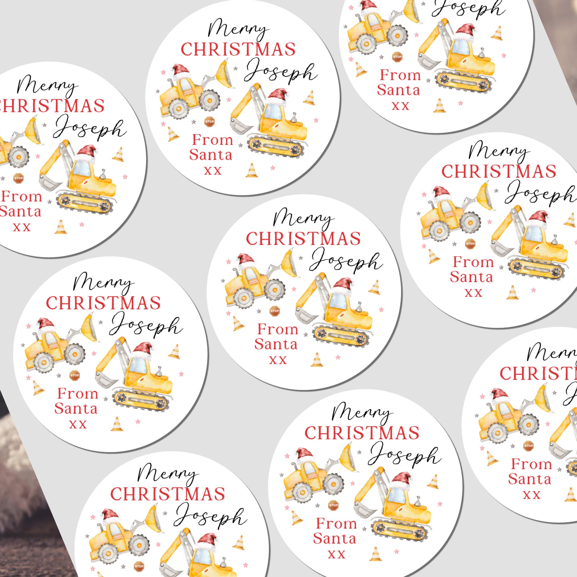 Circular Christmas labels with construction vehicle designs and personalized text on a white background.