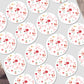 Circular stickers with santa claus deisgn on a white background