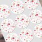 Circular stickers with santa claus design on a white background