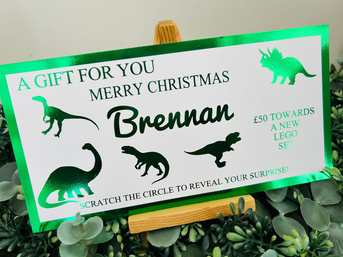 Personalised Foil Christmas Card, Surprise Reveal Scratch Off Ticket, Dinosaurs