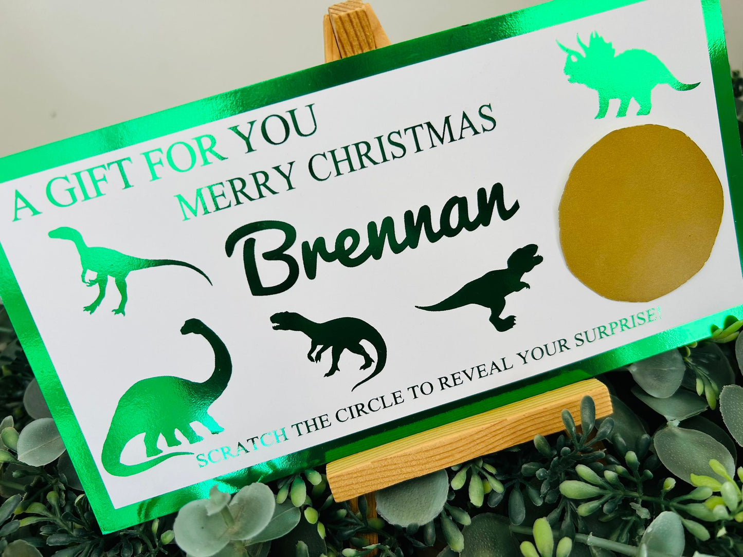 Personalised Foil Christmas Card, Surprise Reveal Scratch Off Ticket, Dinosaurs