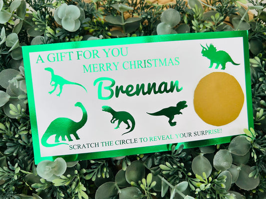 Personalised Foil Christmas Card, Surprise Reveal Scratch Off Ticket, Dinosaurs