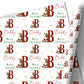 Personalised Christmas wrapping paper featuring Santa Claus, Christmas tree, large initial and name in red, green, gold and white festive design.