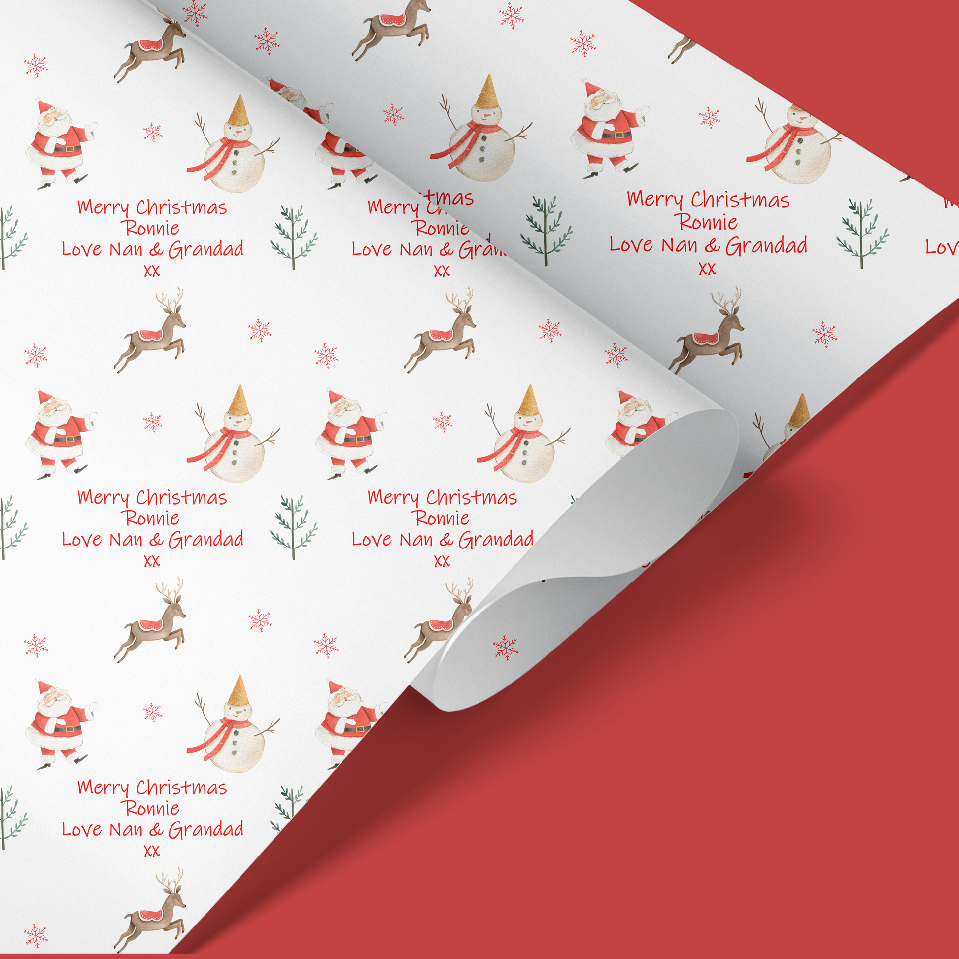 childrens christmas wrapping paper with santa snowman and reindeer pattern.