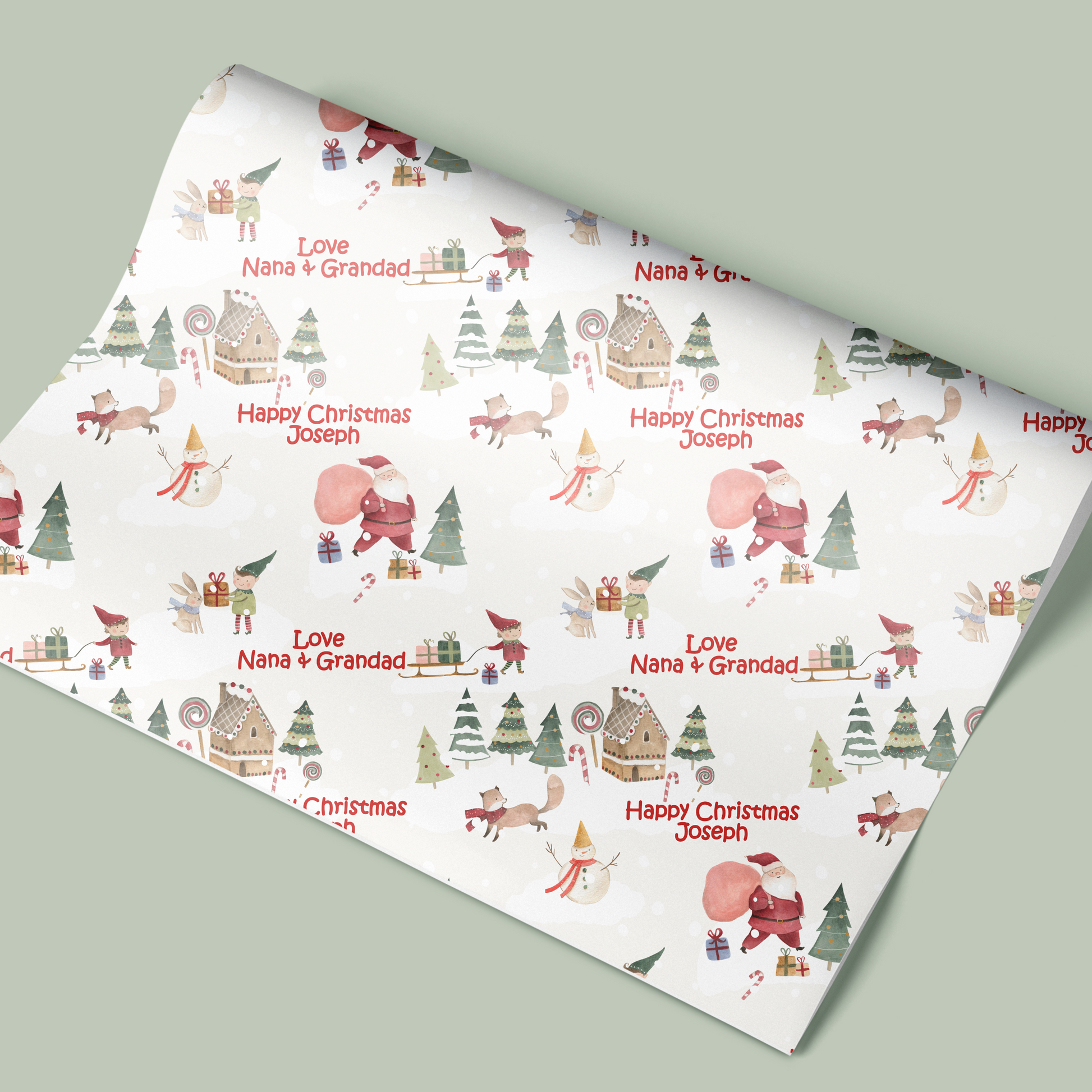 personalised christmas wrapping paper with name and santa claus and elves pattern