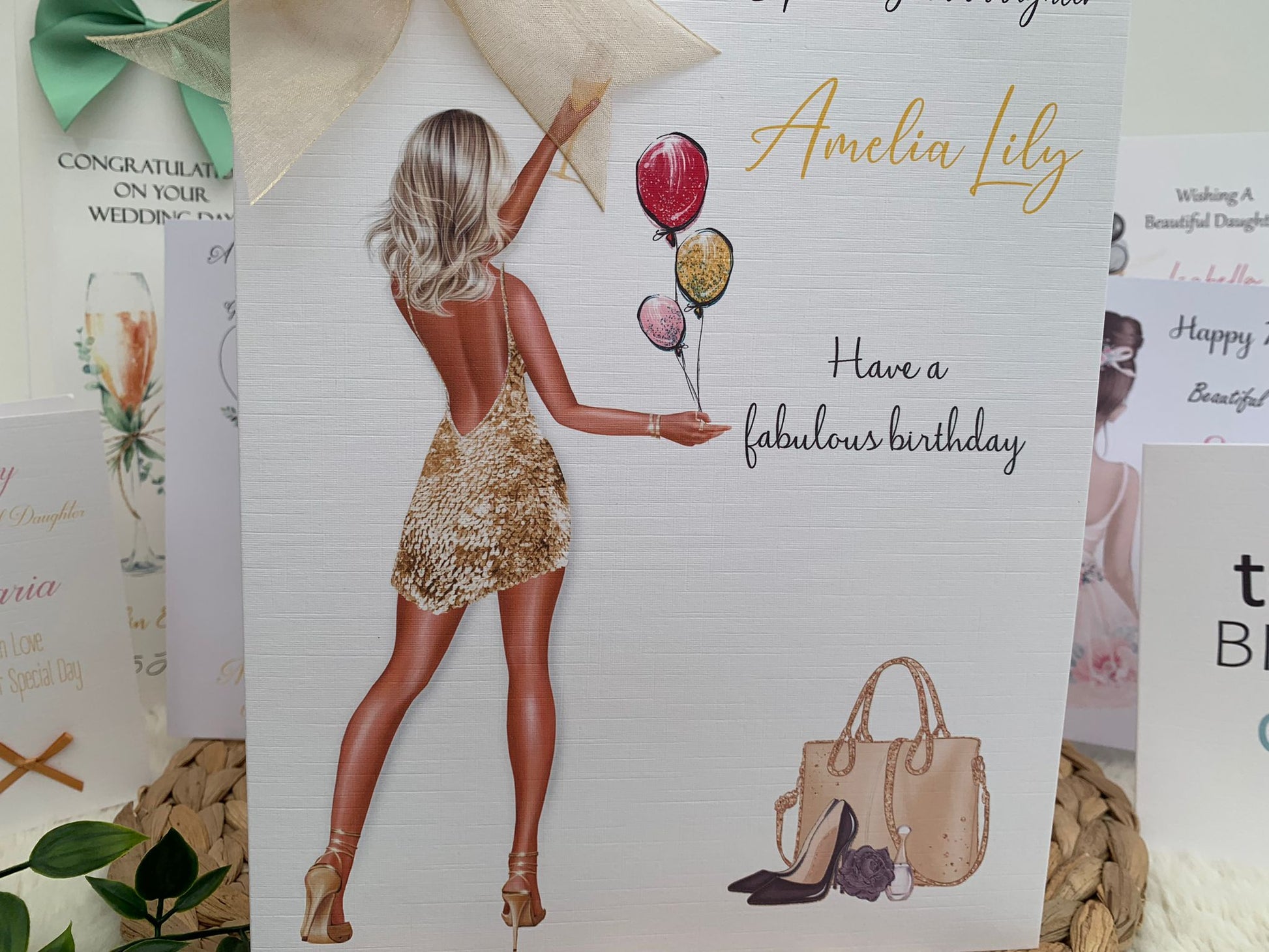 a birthday card with a picture of a woman holding balloons