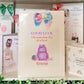 a bunch of greeting cards on a shelf