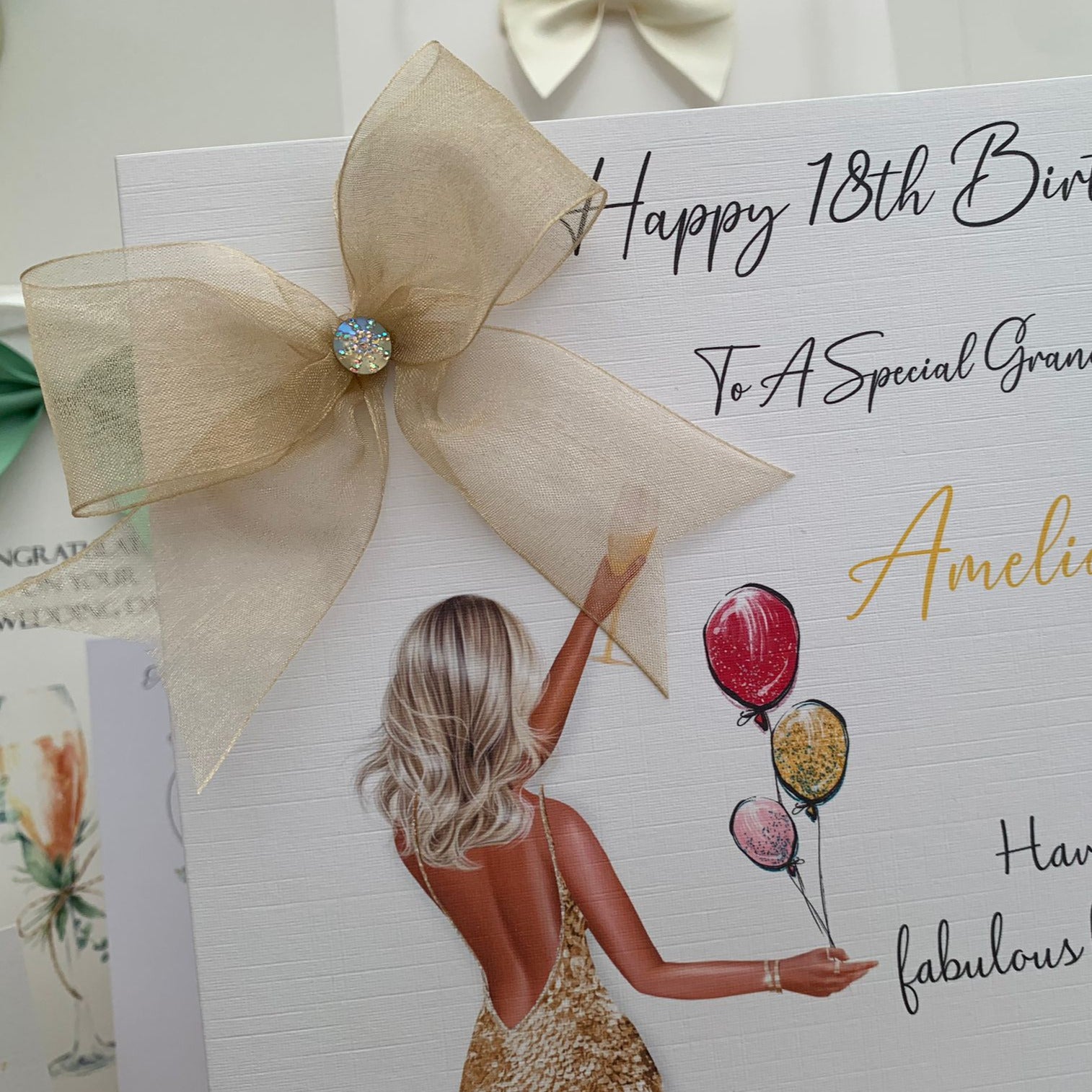 a birthday card with a picture of a woman holding balloons