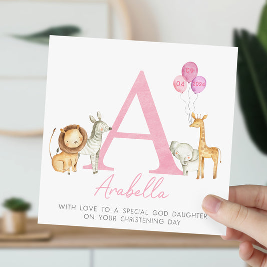 a hand holding up a card with animals and balloons