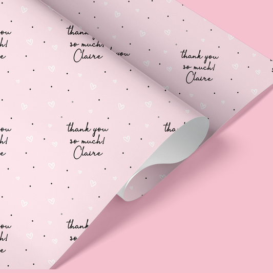 a pink wrapping paper with a thank you message on it