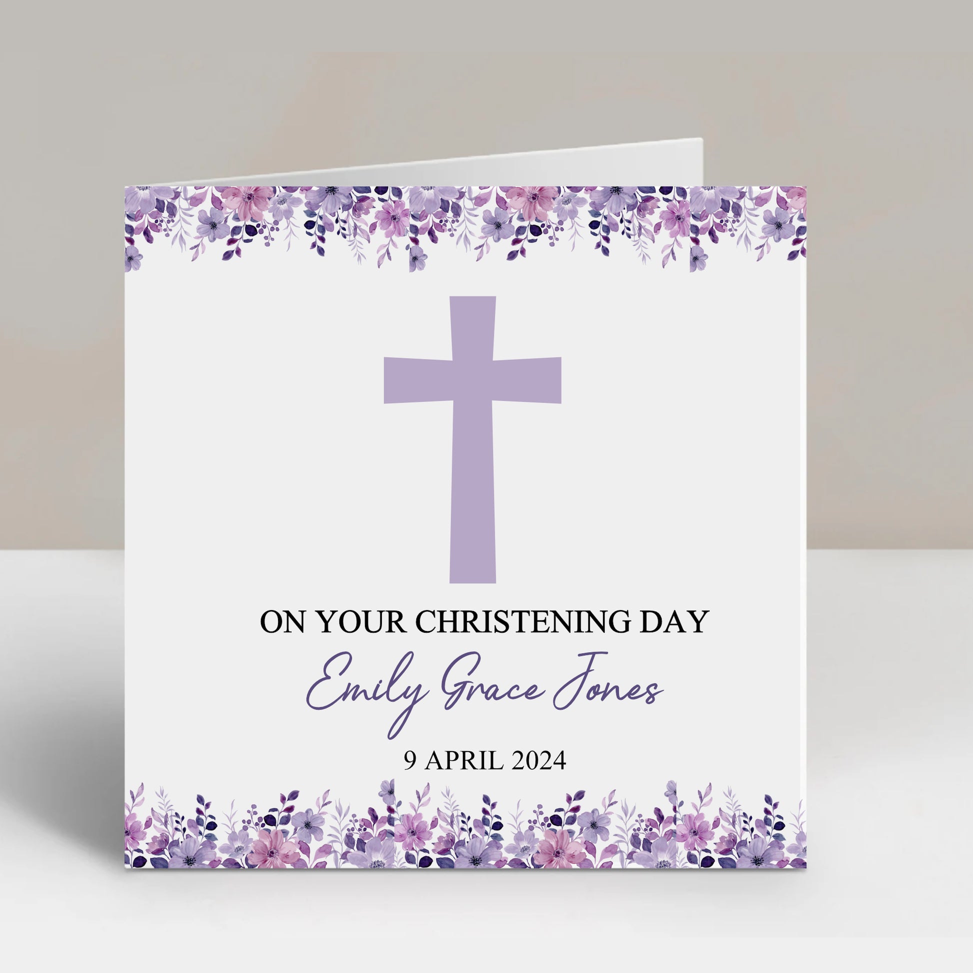 a card with a purple cross on it