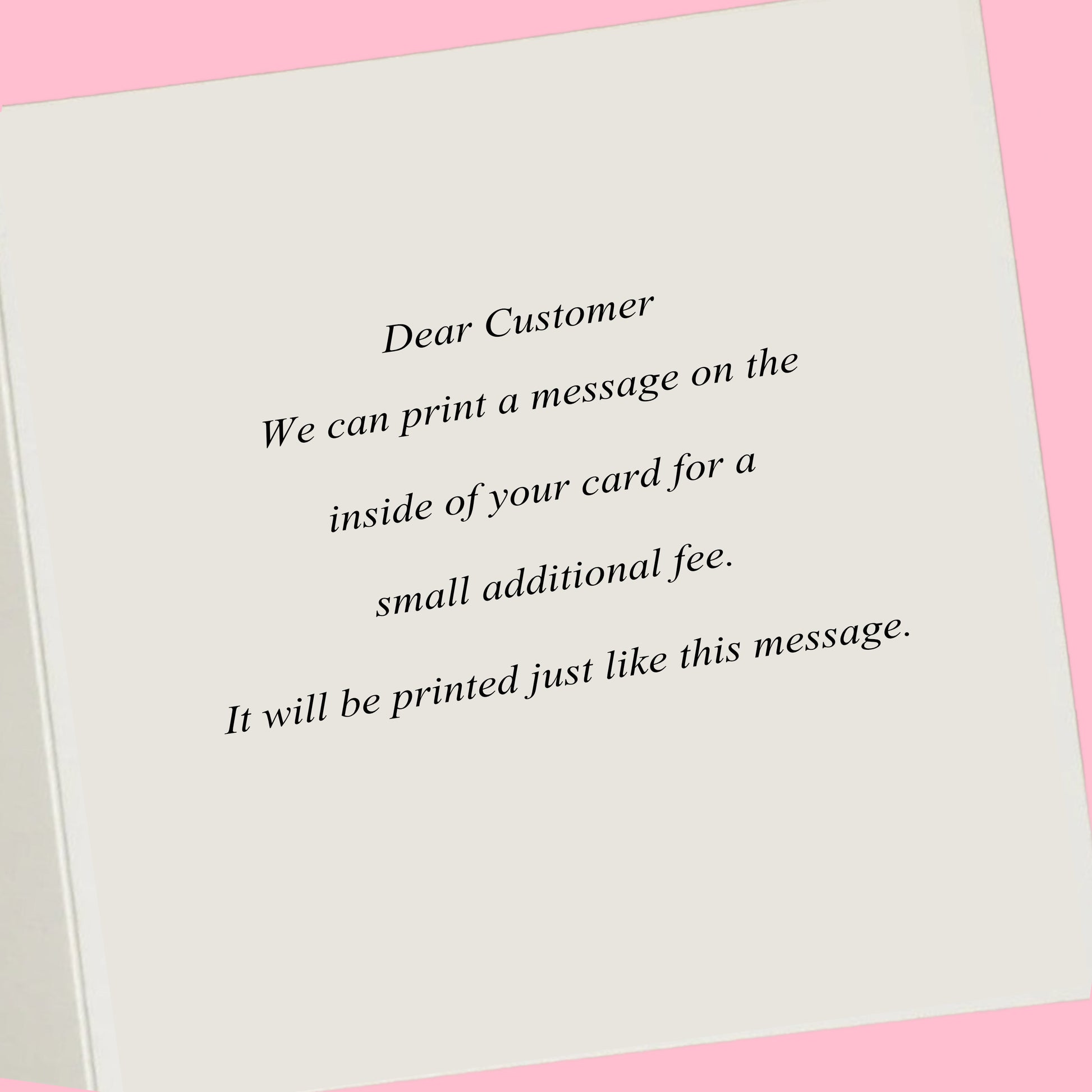 a white card with a message on it on a pink background