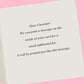 a white card with a message on it on a pink background