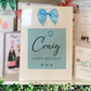 a birthday card with a blue bow on it
