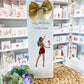 a card with a picture of a woman in a bathing suit