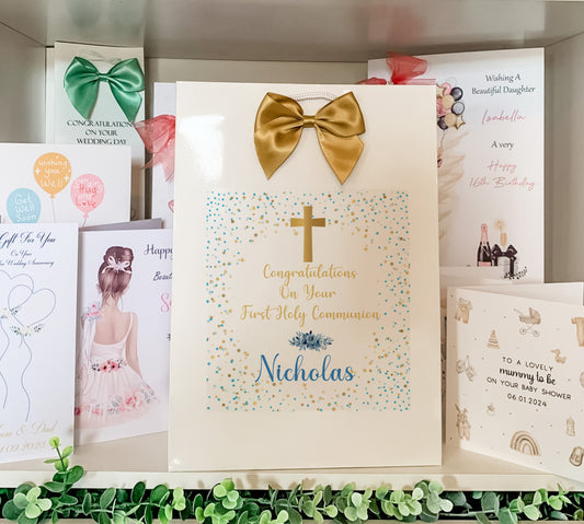 a card with a cross and a bow on it