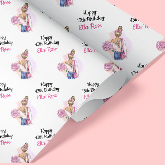 a birthday wrapping paper with a picture of a girl on it