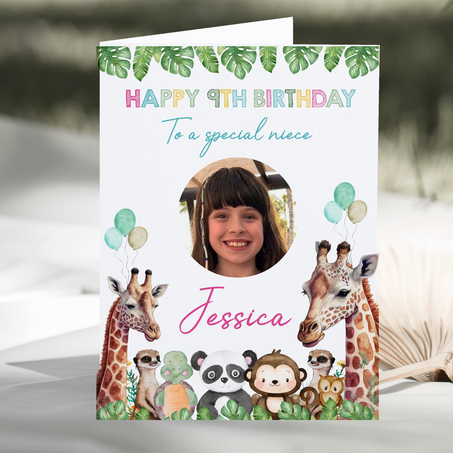 a birthday card with a picture of a giraffe and a monkey