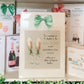 a couple of cards are on a shelf
