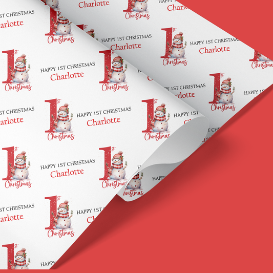 a red and white christmas wrapping paper with the number one on it