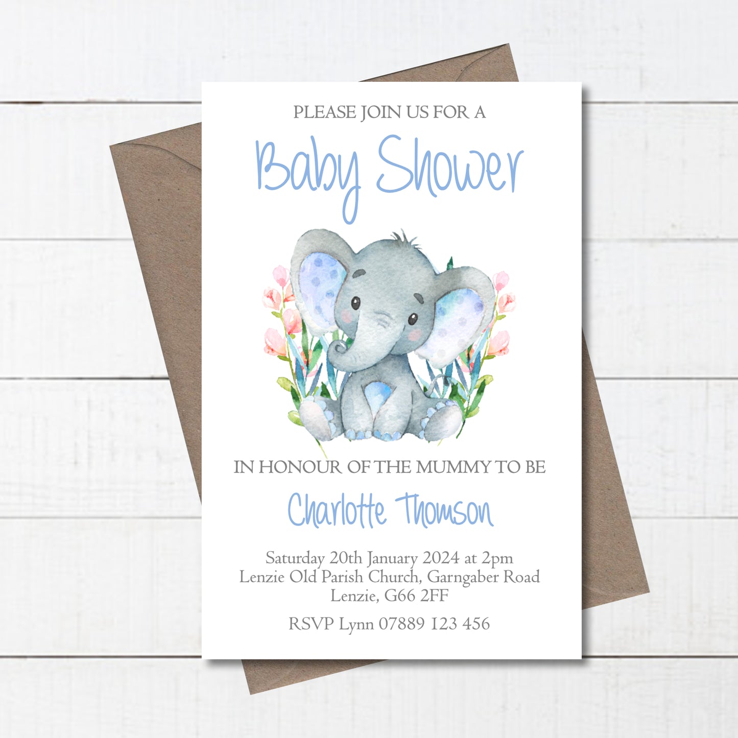 a baby shower card with an elephant and flowers