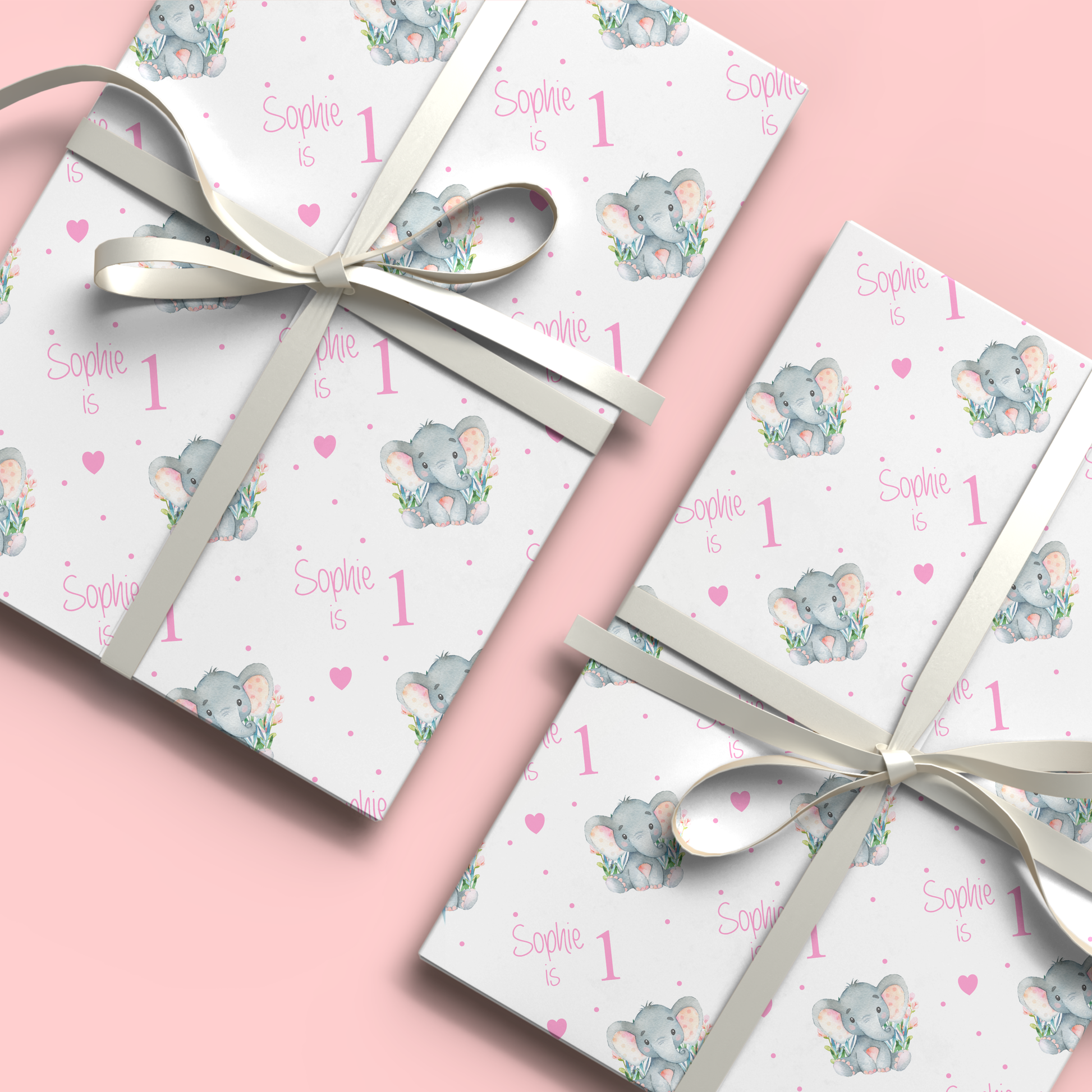 a couple of wrapped presents sitting on top of a pink table