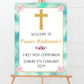 a welcome sign with a cross on it