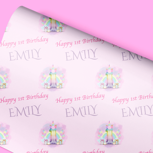 a pink birthday wrapping paper with a candle on it