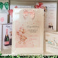 a bunch of greeting cards with a teddy bear