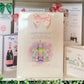 a birthday card with a pink bow on it