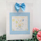 a picture of a happy easter card with a blue bow