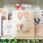 a bunch of cards that are on a shelf