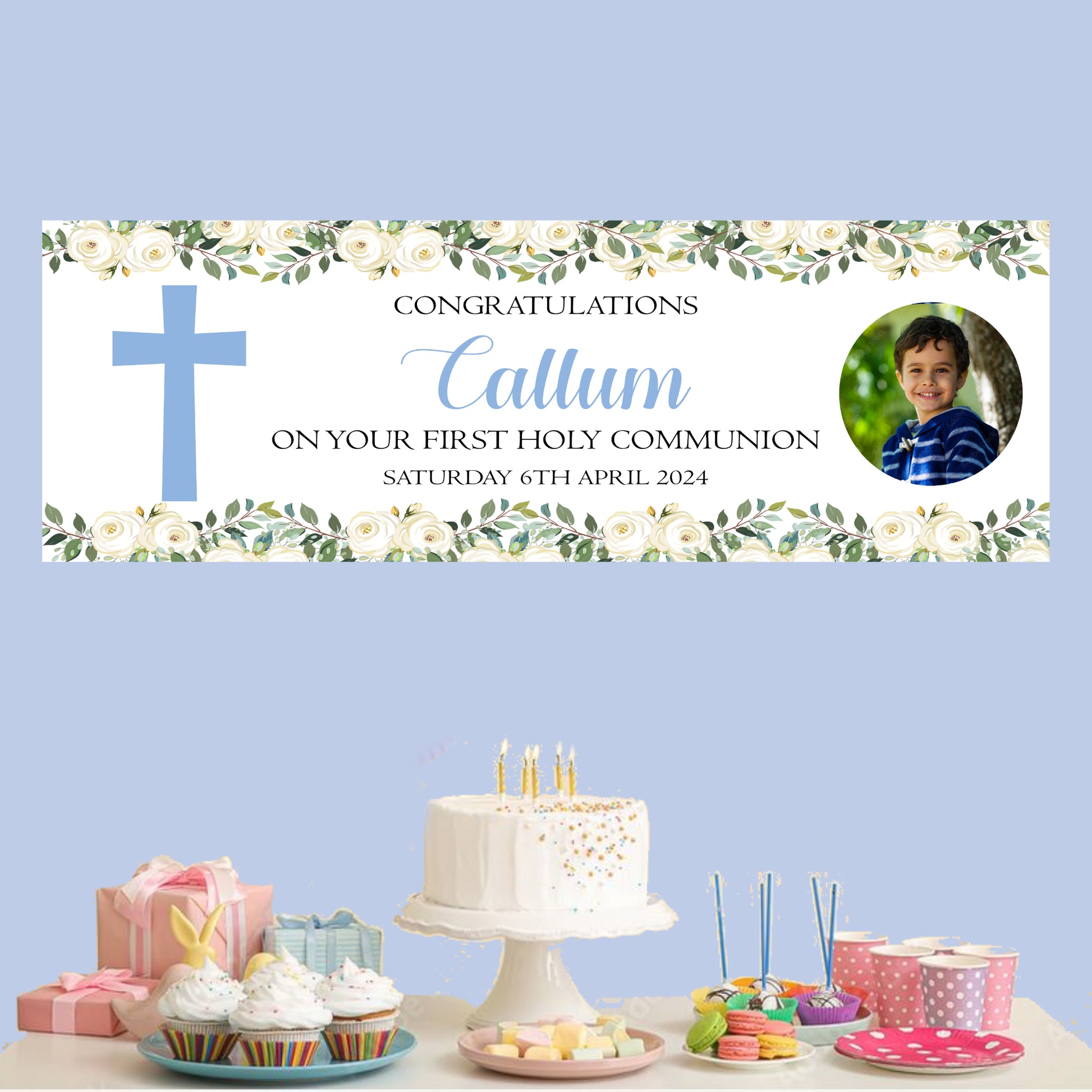 a table topped with a cake and cupcakes