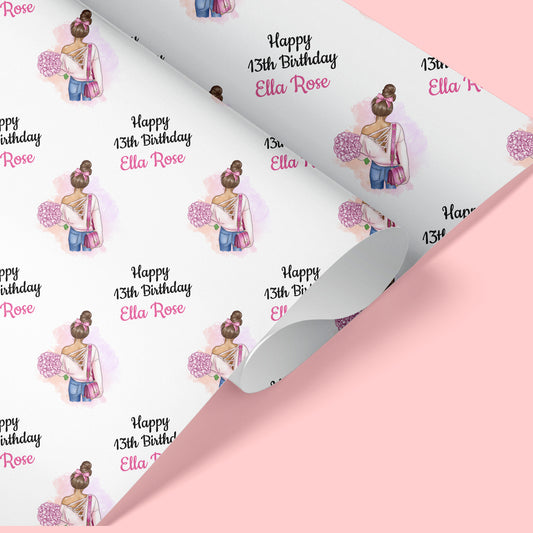 a birthday wrapping paper with a picture of a girl on it