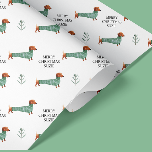 a christmas wrapping paper with a dachshund pattern