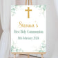 a white sign with a cross on it